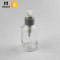 botella de vidrio cosmético del hombro oblicuo con bomba de loción